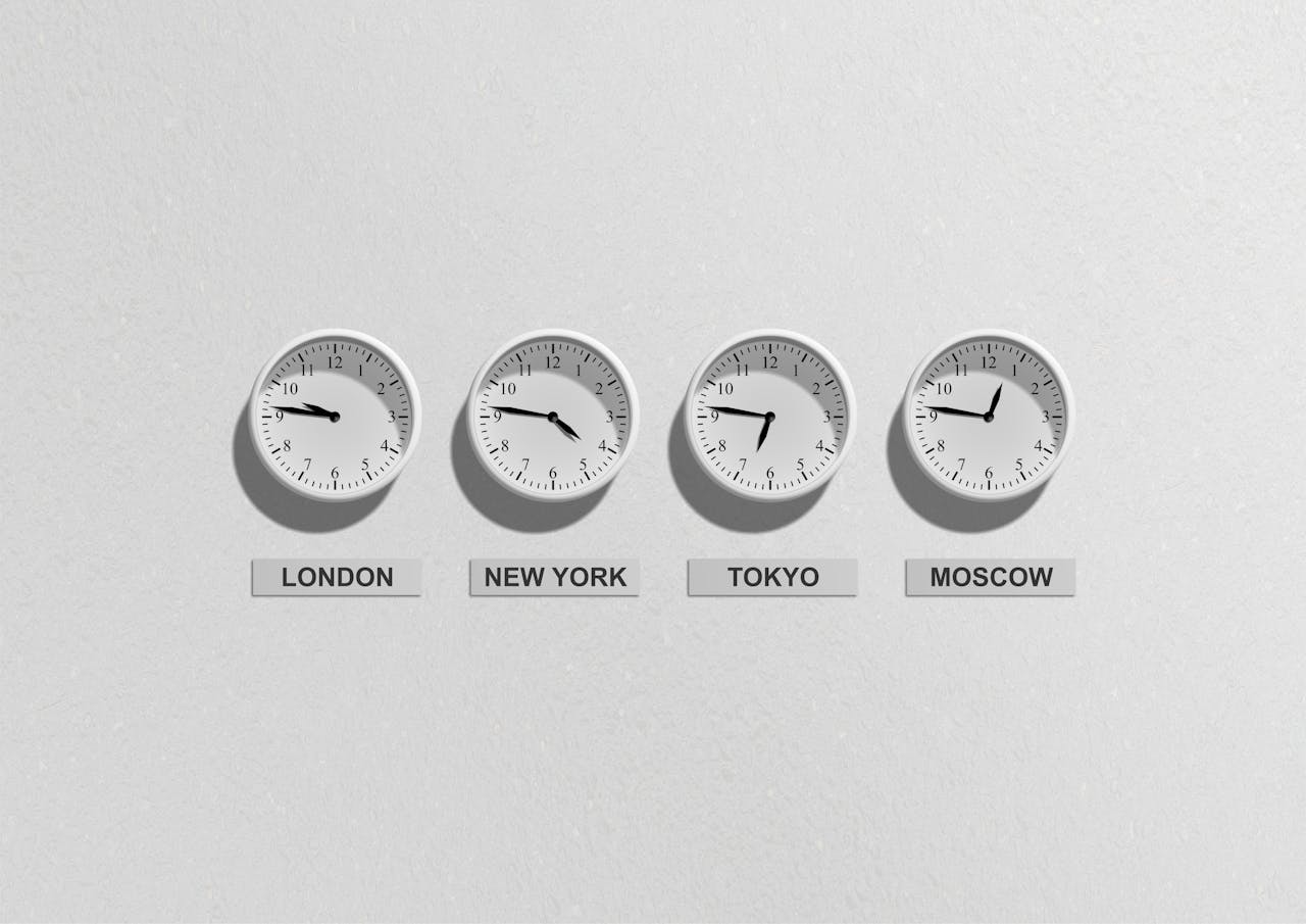 about-us-01 Four wall clocks showing different time zones for London, New York, Tokyo, and Moscow.
